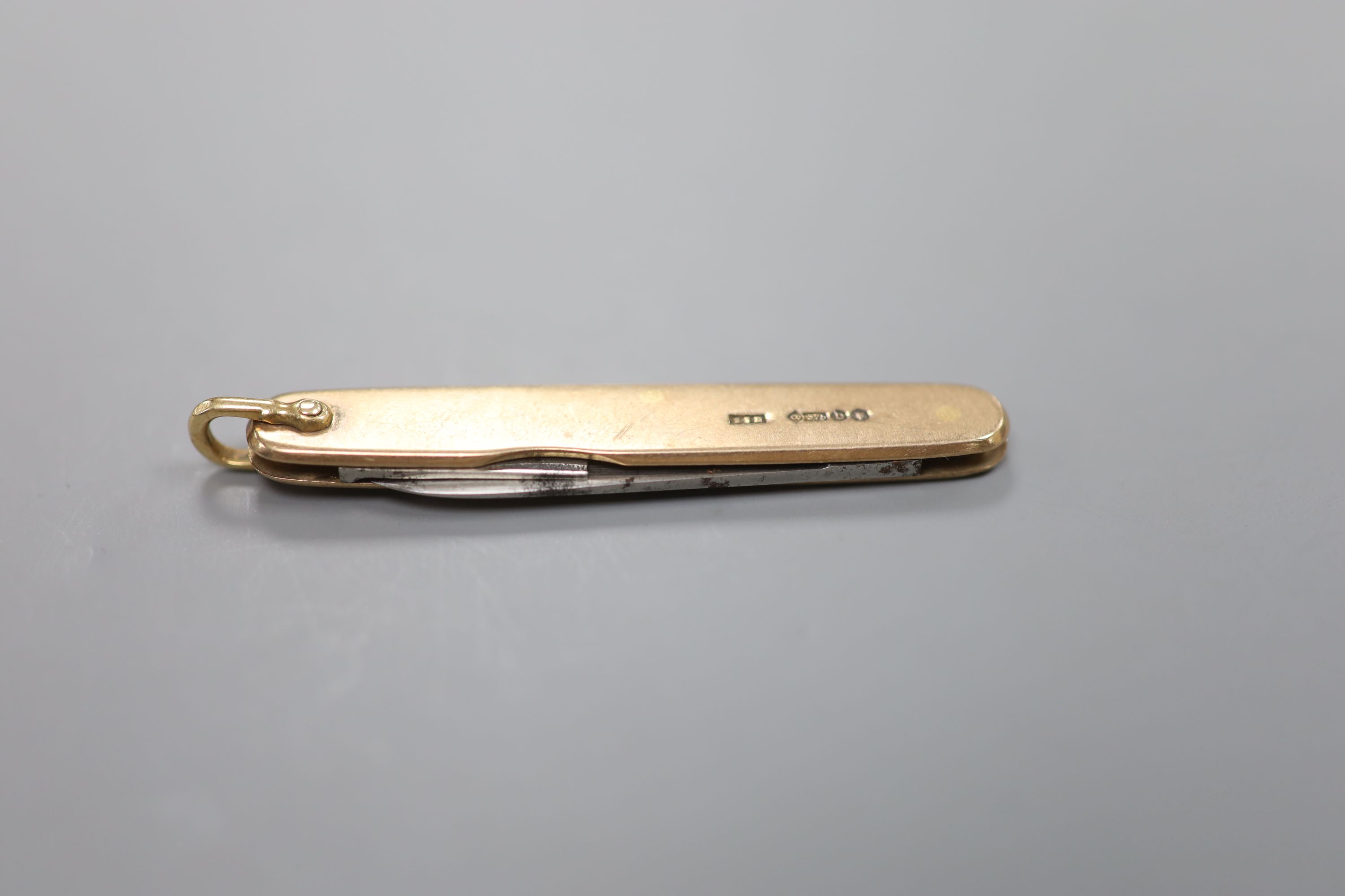 A late Victorian 9ct gold mounted pocket knife, 57mm, gross 15.2 grams.